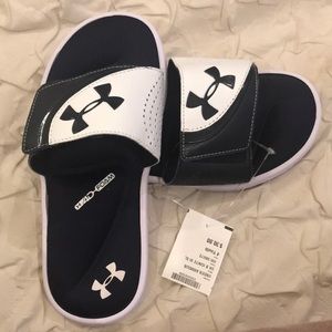Youth size 4 under armour slides nwt